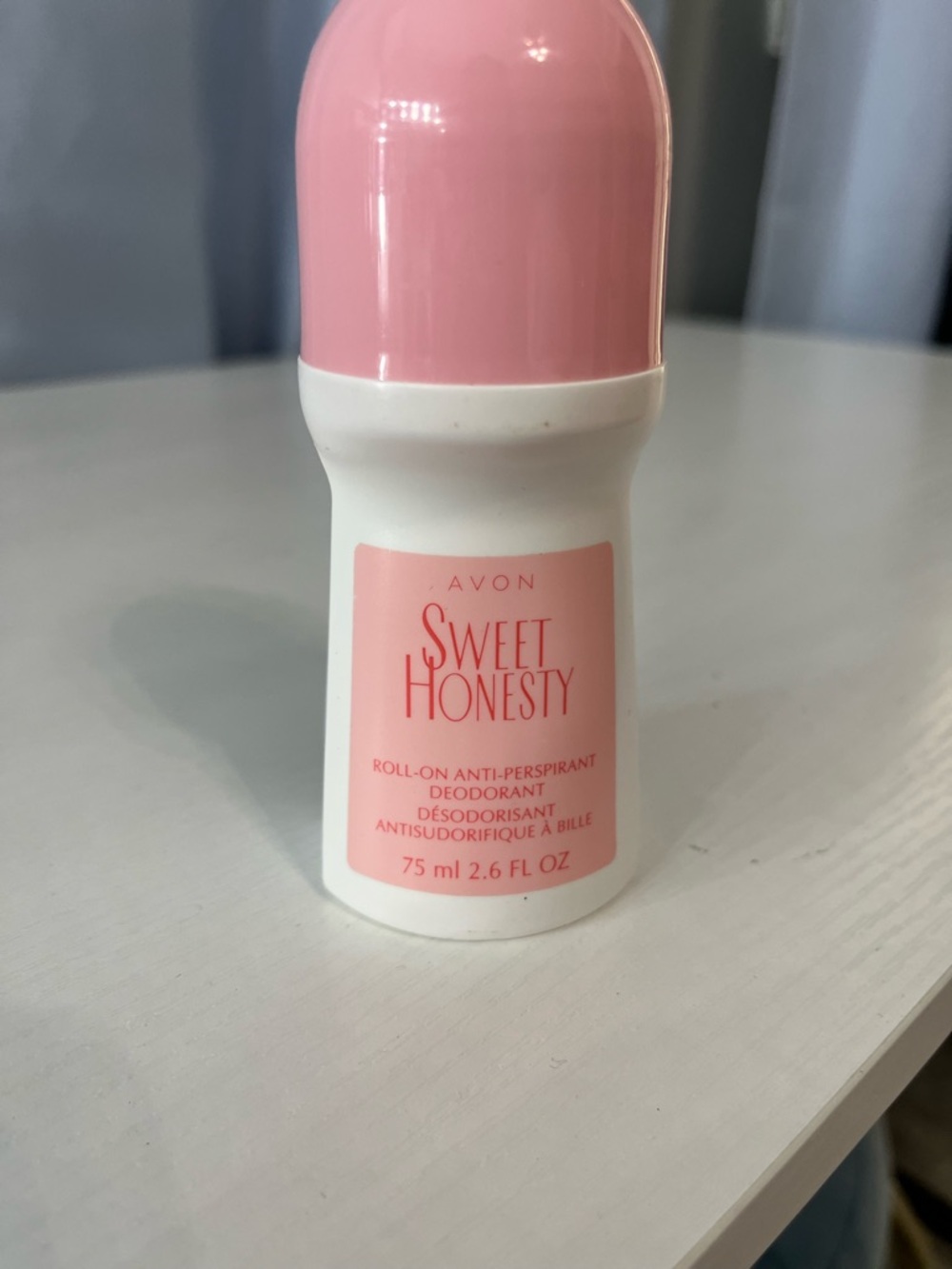 Avon Pink and White Roll-On Antiperspirant